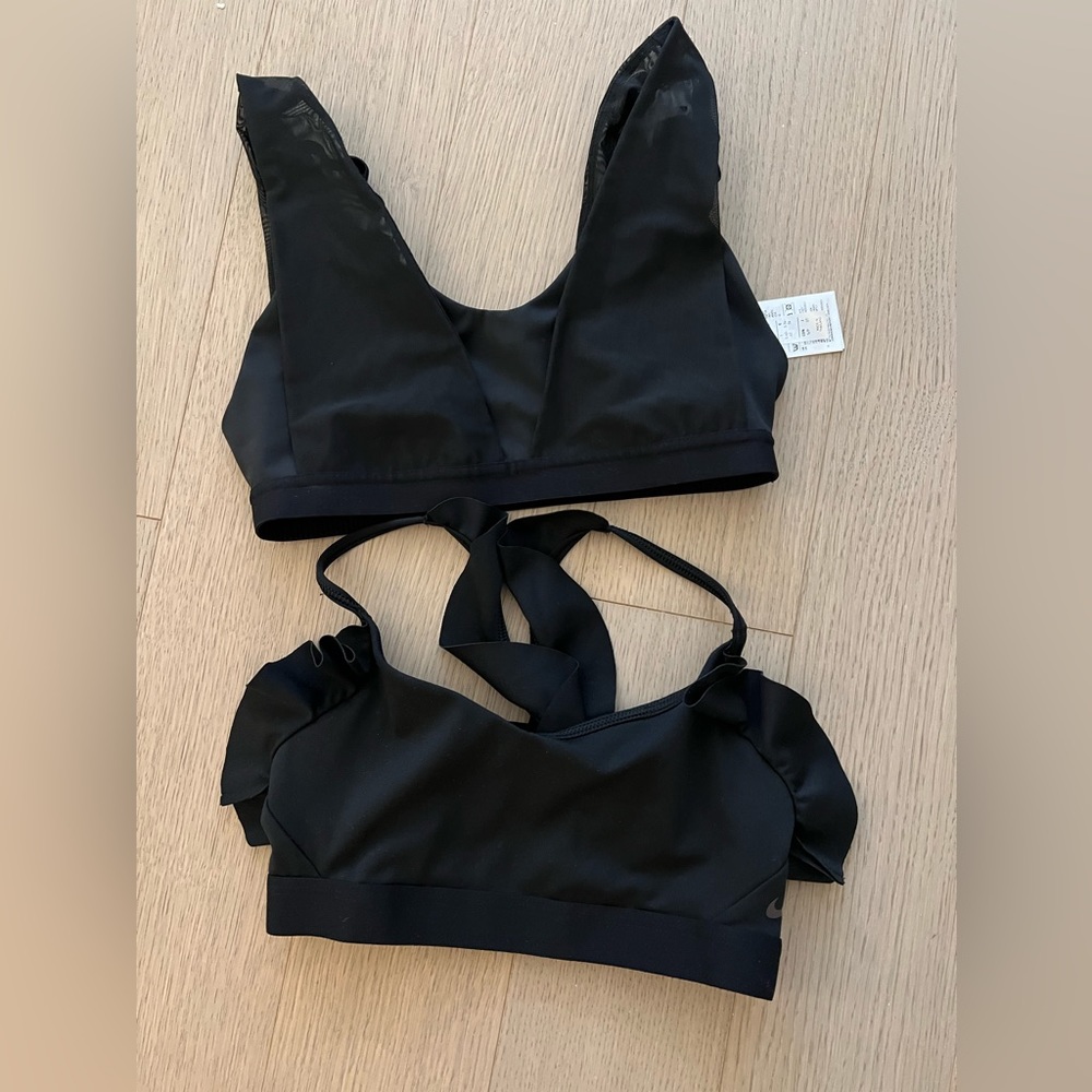 Two black Adidas sports bras - size small. Mesh and ruffles